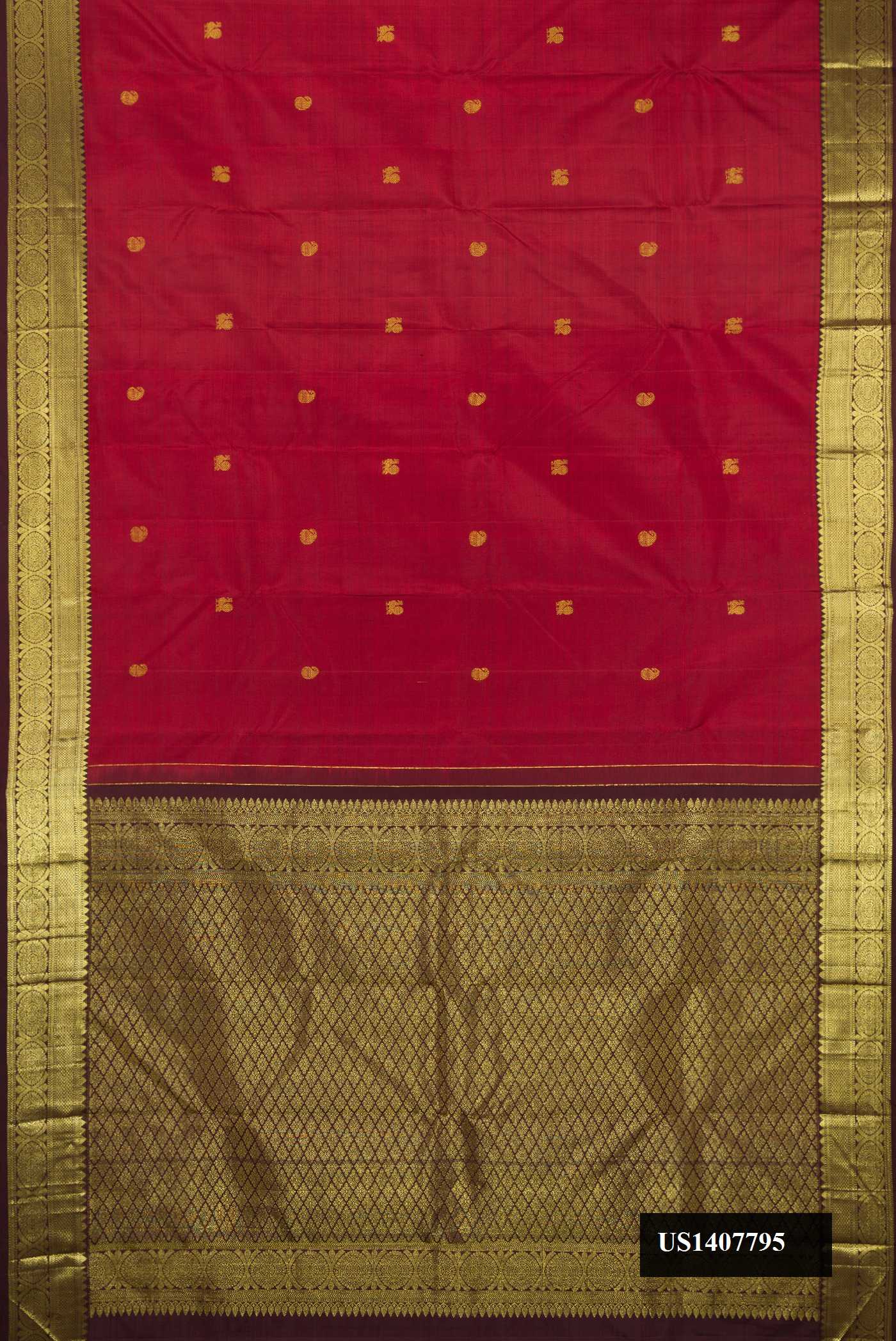 Maroon Dual Tone Kanchipuram Silk Saree with Zari Butta on the body and Zari Border.  displayed on a mannequin