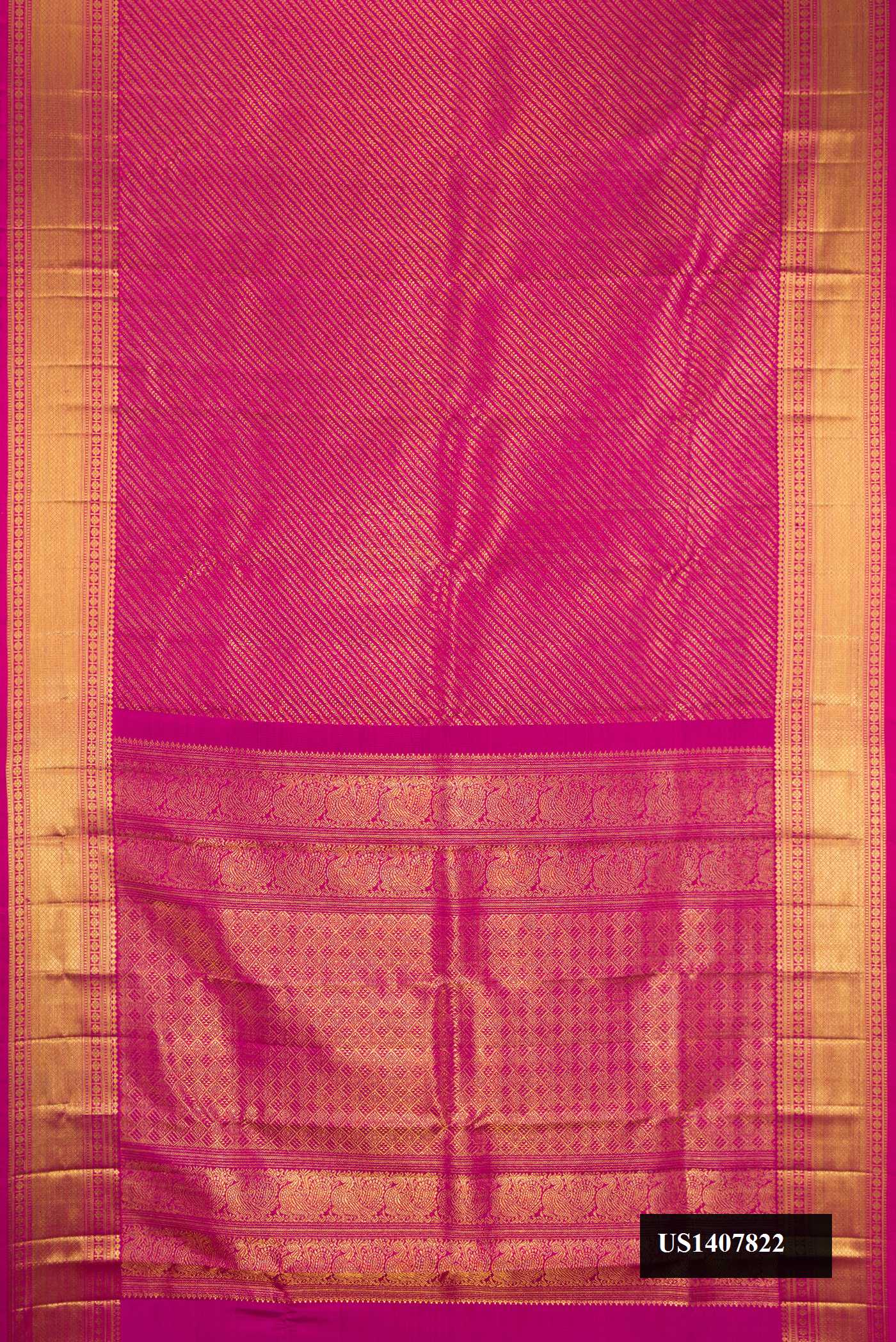 Magenta Dual Tone Kanchipuram Silk Saree with Zari Brocade on the body and Zari Border.  displayed on a mannequin