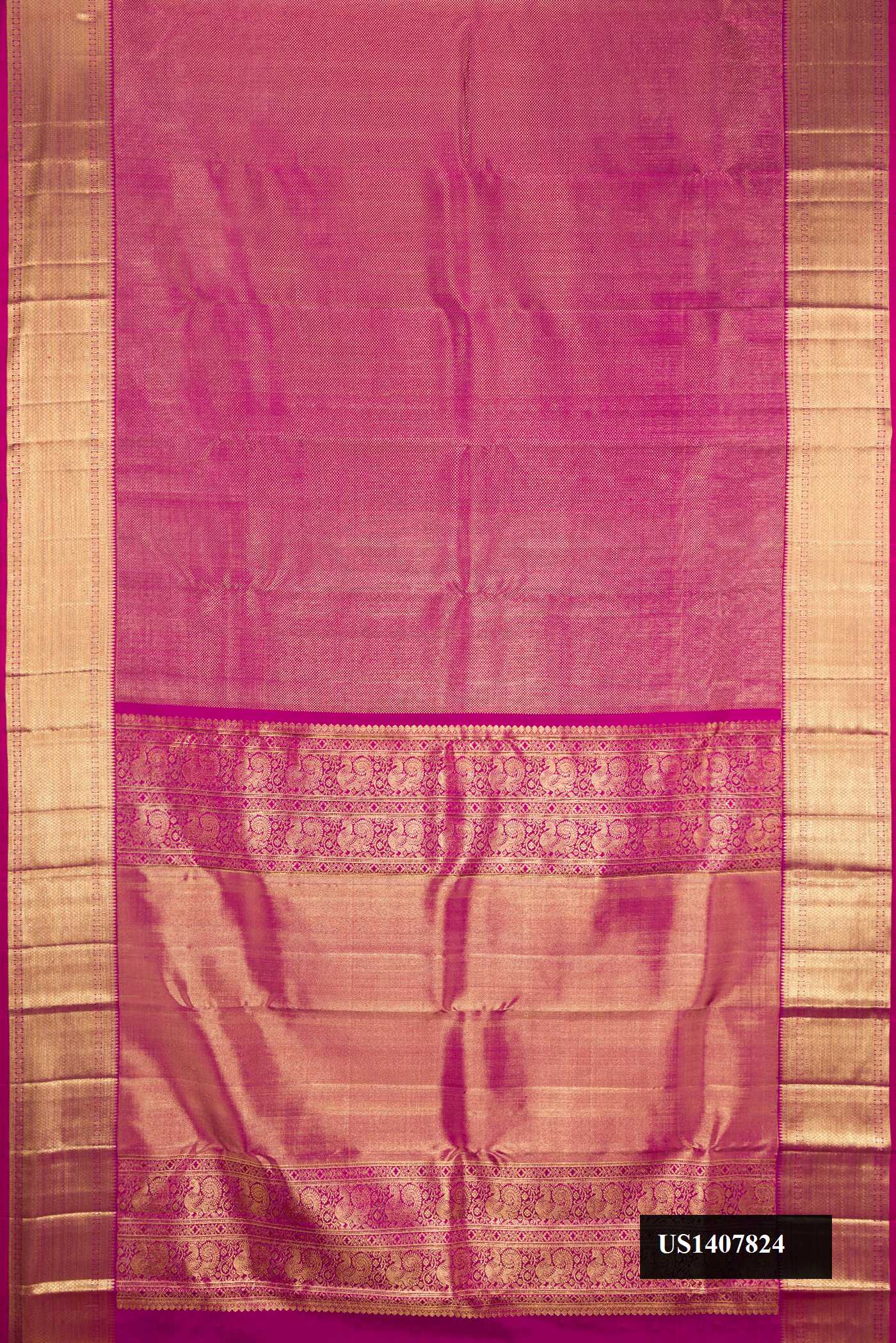 Magenta Dual Tone Kanchipuram Silk Saree with Zari Brocade on the body and Zari Border.  displayed on a mannequin