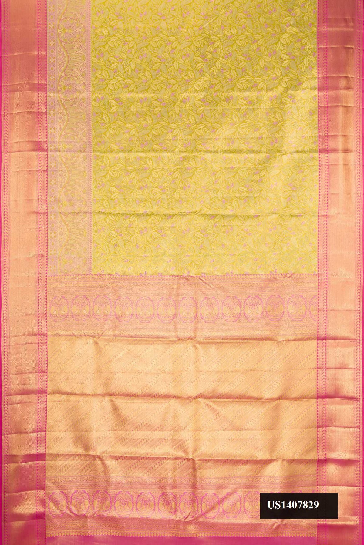 Green Dual Tone Kanchipuram Tissue Silk Saree with Zari Brocade on the body and Zari Border.  displayed on a mannequin