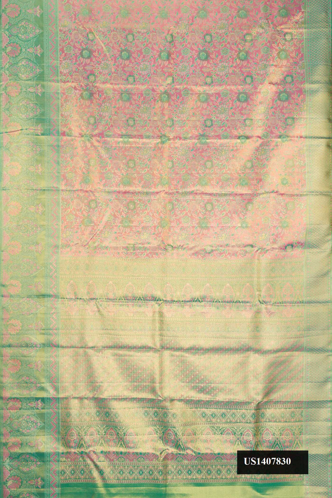 Pink Dual Tone Kanchipuram Tissue Silk Saree with Zari Brocade on the body and Fancy Border.  displayed on a mannequin