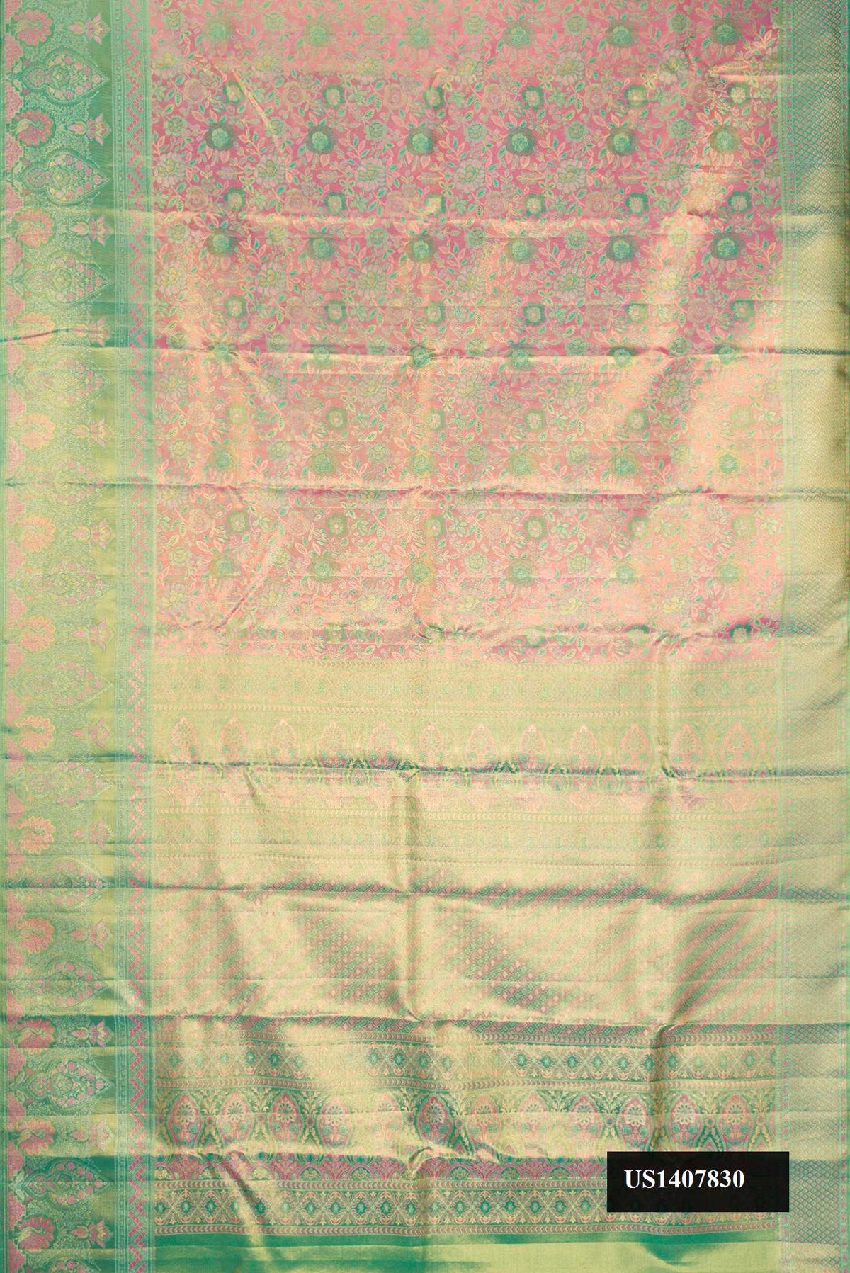 Pink Dual Tone Kanchipuram Tissue Silk Saree with Zari Brocade on the body and Fancy Border.  displayed on a mannequin