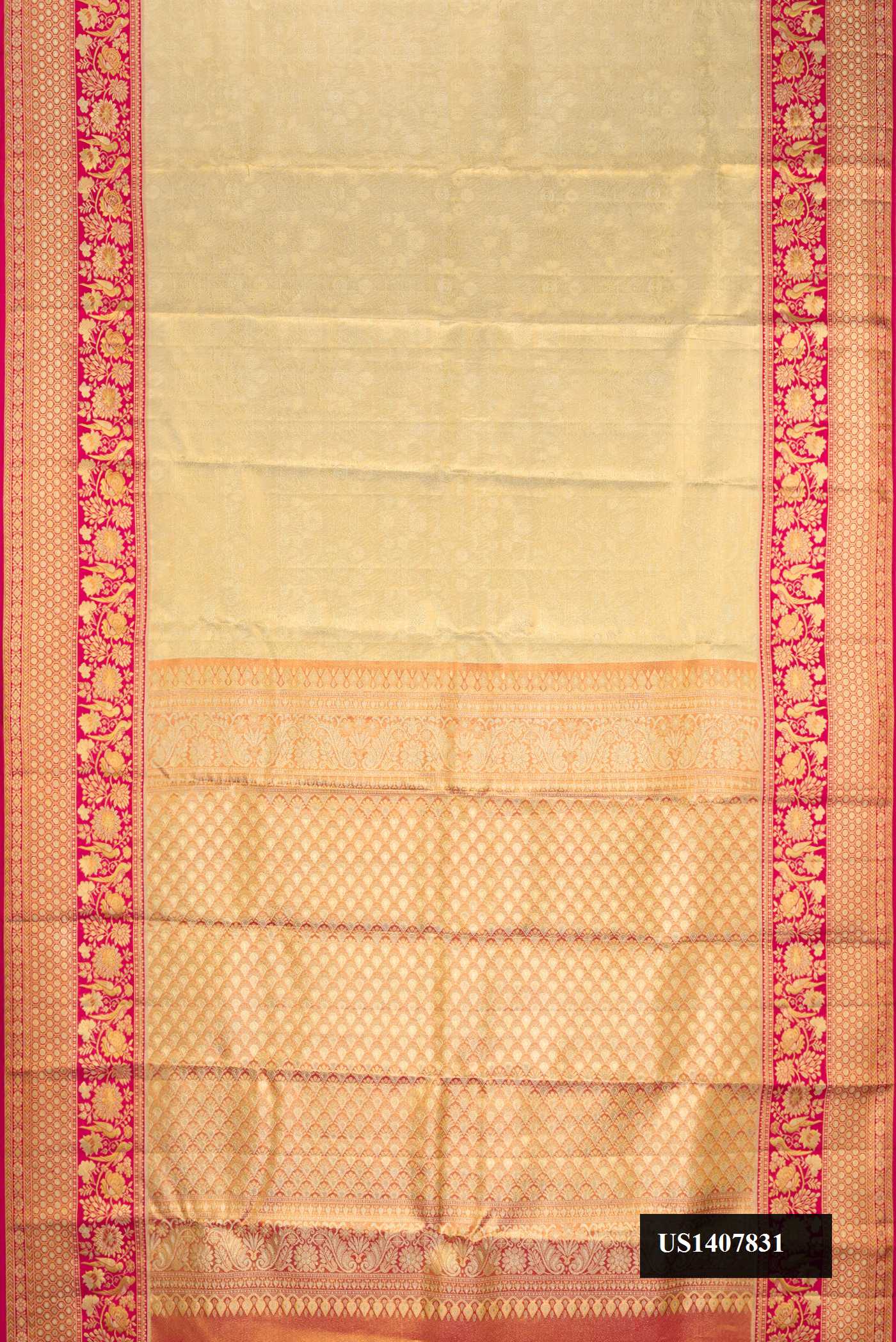 Gold Dual Tone Kanchipuram Tissue Silk Saree with Zari Brocade on the body and Fancy Border.  displayed on a mannequin