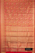 Red Dual Tone Kanchipuram Tissue Silk Saree with Zari Brocade on the body and Fancy Border.  displayed on a mannequin
