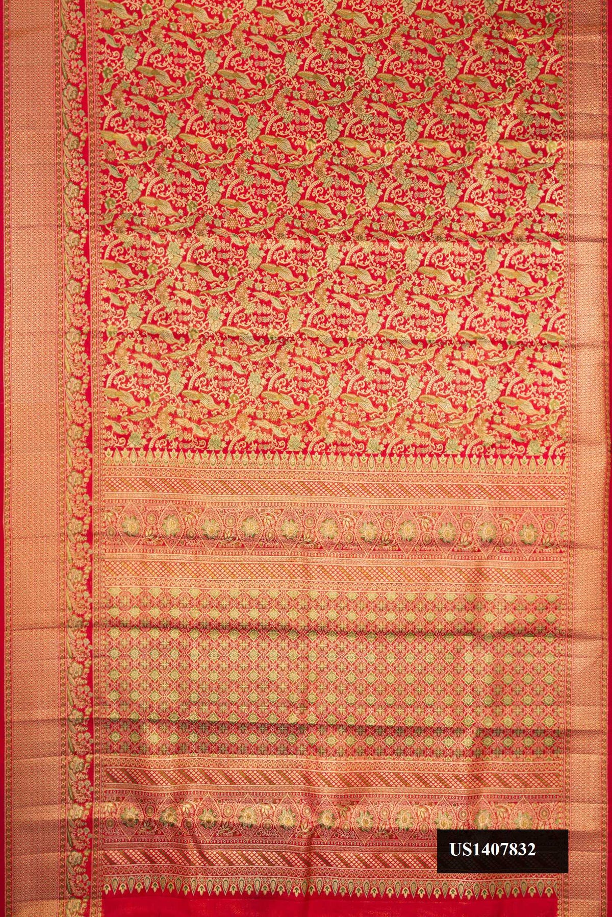 Red Dual Tone Kanchipuram Tissue Silk Saree with Zari Brocade on the body and Fancy Border.  displayed on a mannequin