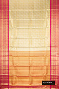Gold Dual Tone Kanchipuram Tissue Silk Saree with Zari Brocade on the body and Zari Border.  displayed on a mannequin