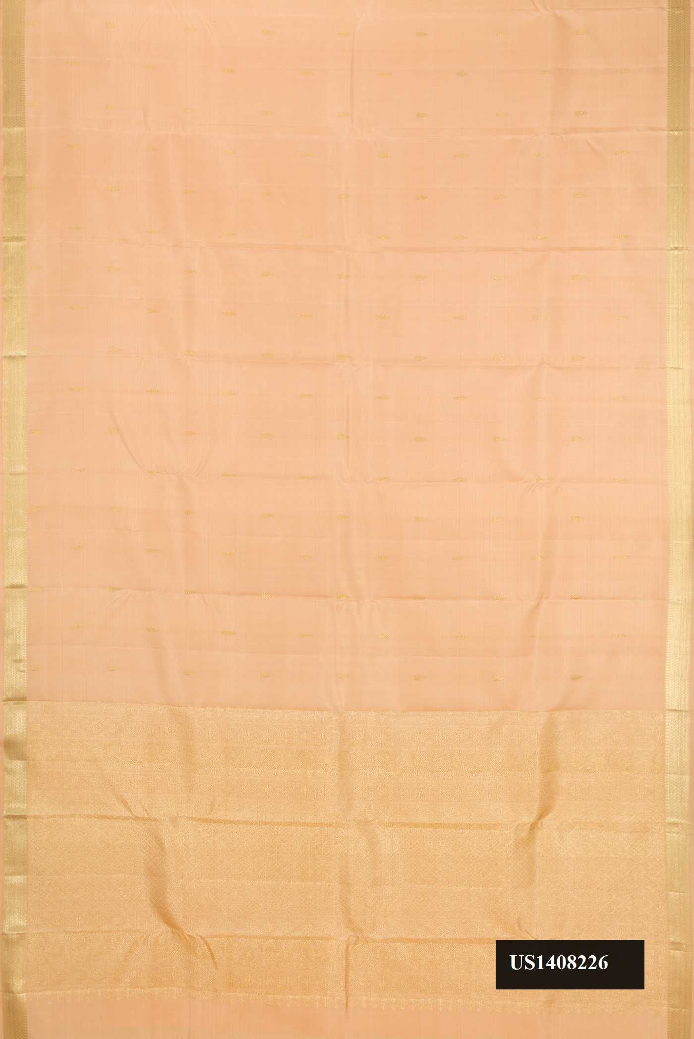 Golden Peach Dual Tone Kanchipuram Silk Saree with Zari Butta on the body and Zari Border.  displayed on a mannequin