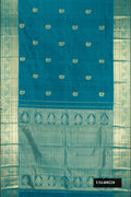 Peacock Blue Dual Tone Kanchipuram Silk Saree with Zari Butta on the body and Zari Border.  displayed on a mannequin