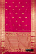 Dark Pink Dual Tone Kanchipuram Silk Saree with Zari Butta on the body and Zari Border.  displayed on a mannequin