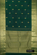 Bottle Green Dual Tone Kanchipuram Silk Saree with Zari Butta on the body and Zari Border.  displayed on a mannequin