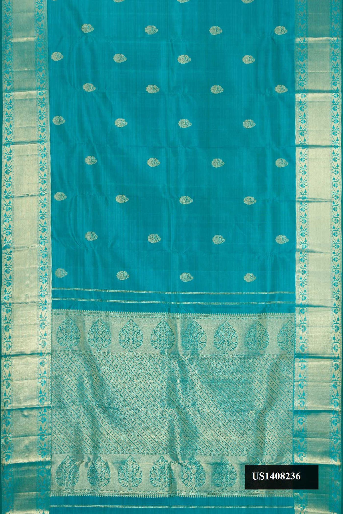 Teal Dual Tone Kanchipuram Silk Saree with Zari Butta on the body and Zari Border.  displayed on a mannequin