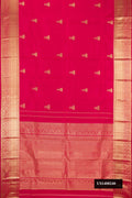 Dark Pink Dual Tone Kanchipuram Silk Saree with Zari Butta on the body and Zari Border.  displayed on a mannequin