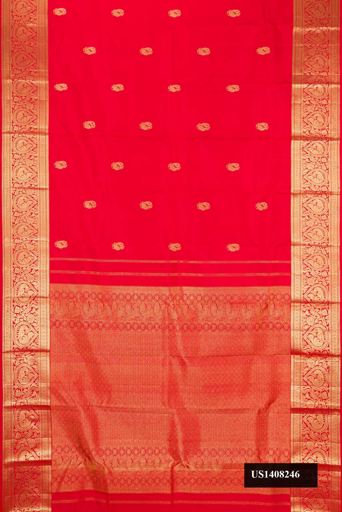 Red Dual Tone Kanchipuram Silk Saree with Zari Butta on the body and Zari Border.  displayed on a mannequin