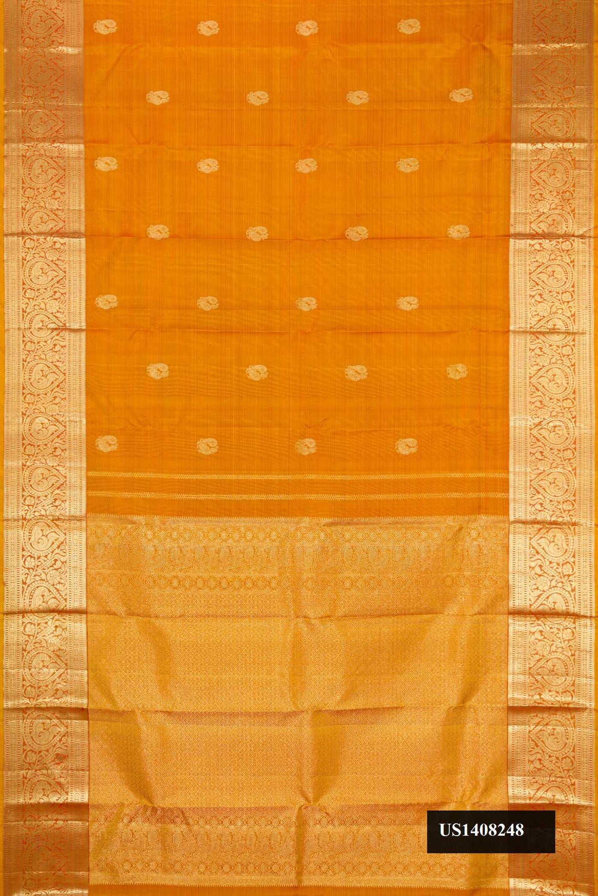 Mustard Dual Tone Kanchipuram Silk Saree with Zari Butta on the body and Zari Border.  displayed on a mannequin