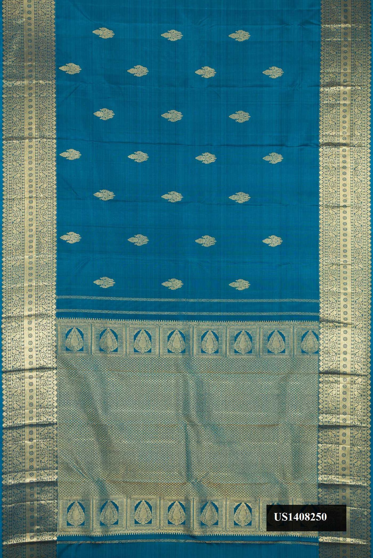 Teal Dual Tone Kanchipuram Silk Saree with Zari Butta on the body and Zari Border.  displayed on a mannequin