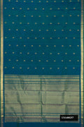 Peacock Blue Dual Tone Kanchipuram Silk Saree with Zari Butta on the body and Zari Border.  displayed on a mannequin
