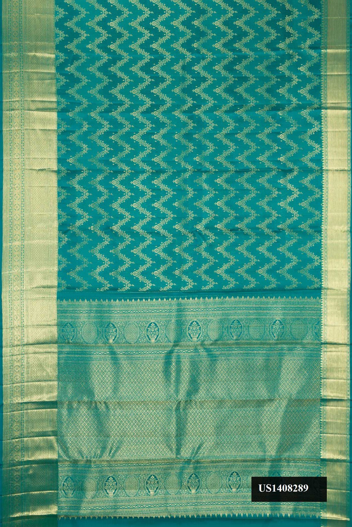 Green Dual Tone Kanchipuram Silk Saree with Zari Brocade on the body and Zari Border.  displayed on a mannequin