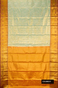 Light Blue Dual Tone Kanchipuram Tissue Silk Saree with Zari Brocade on the body and Zari Border.  displayed on a mannequin