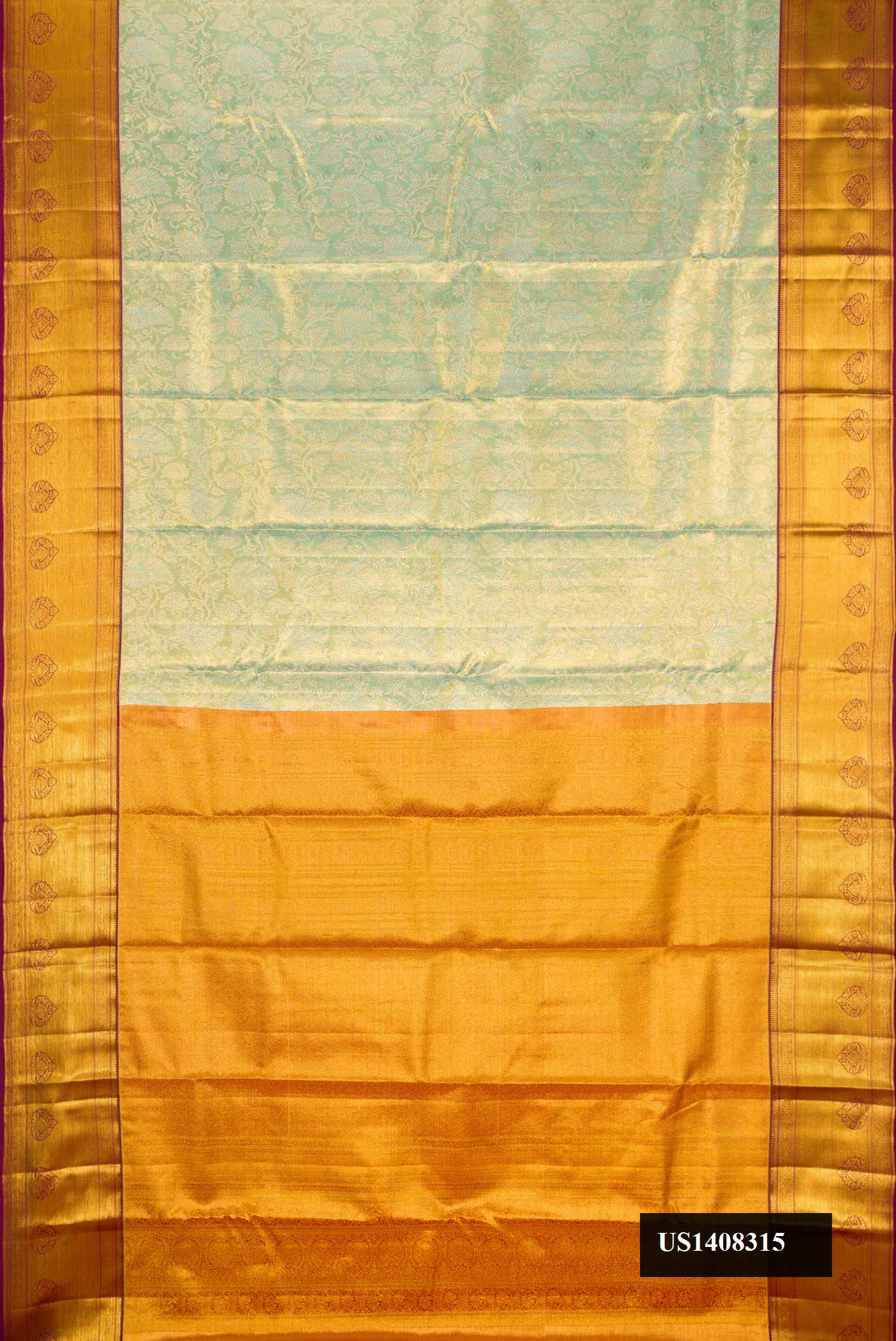 Light Blue Dual Tone Kanchipuram Tissue Silk Saree with Zari Brocade on the body and Zari Border.  displayed on a mannequin
