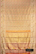 Gold Dual Tone Kanchipuram Tissue Silk Saree with Zari Brocade on the body and Zari Border.  displayed on a mannequin