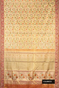 Gold Dual Tone Kanchipuram Tissue Silk Saree with Zari Brocade on the body and Zari Border.  displayed on a mannequin
