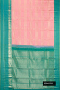 Rose pink Dual Tone Kanchipuram Silk Saree with Zari Brocade on the body and Fancy Border.  displayed on a mannequin