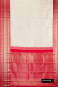 Off White Dual Tone Kanchipuram Silk Saree with Zari Brocade on the body and Fancy Border.  displayed on a mannequin