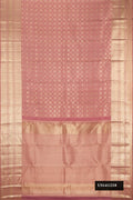 Rose Gold Dual Tone Kanchipuram Silk Saree with Zari Brocade on the body and Fancy Border.  displayed on a mannequin
