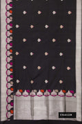 Black Dual Tone Banarasi Silk Saree with Zari Butta on the body and Fancy Border.  displayed on a mannequin
