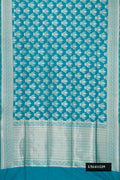 Peacock Blue Dual Tone Banarasi Silk Saree with Zari Brocade on the body and Fancy Border.  displayed on a mannequin