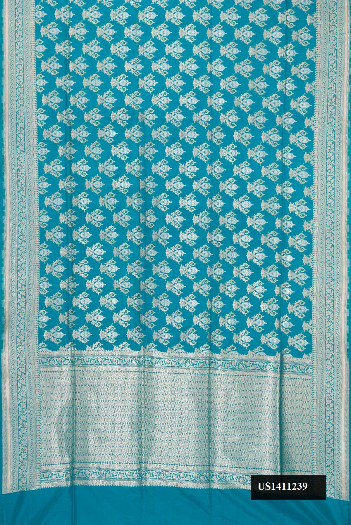 Peacock Blue Dual Tone Banarasi Silk Saree with Zari Brocade on the body and Fancy Border.  displayed on a mannequin