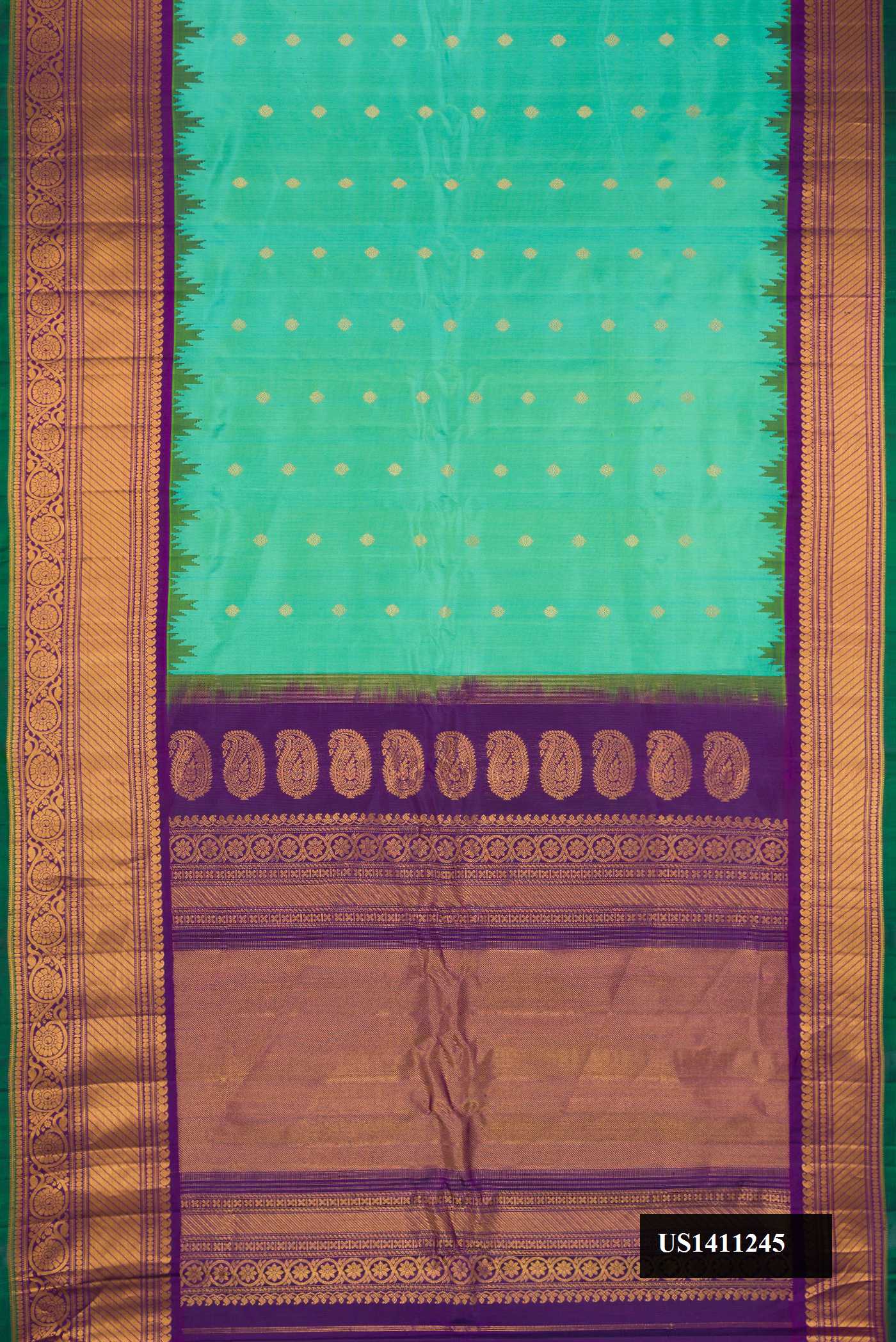 Sky Blue Dual Tone Gadwal Silk Saree with Zari Butta on the body and Fancy Border.  displayed on a mannequin