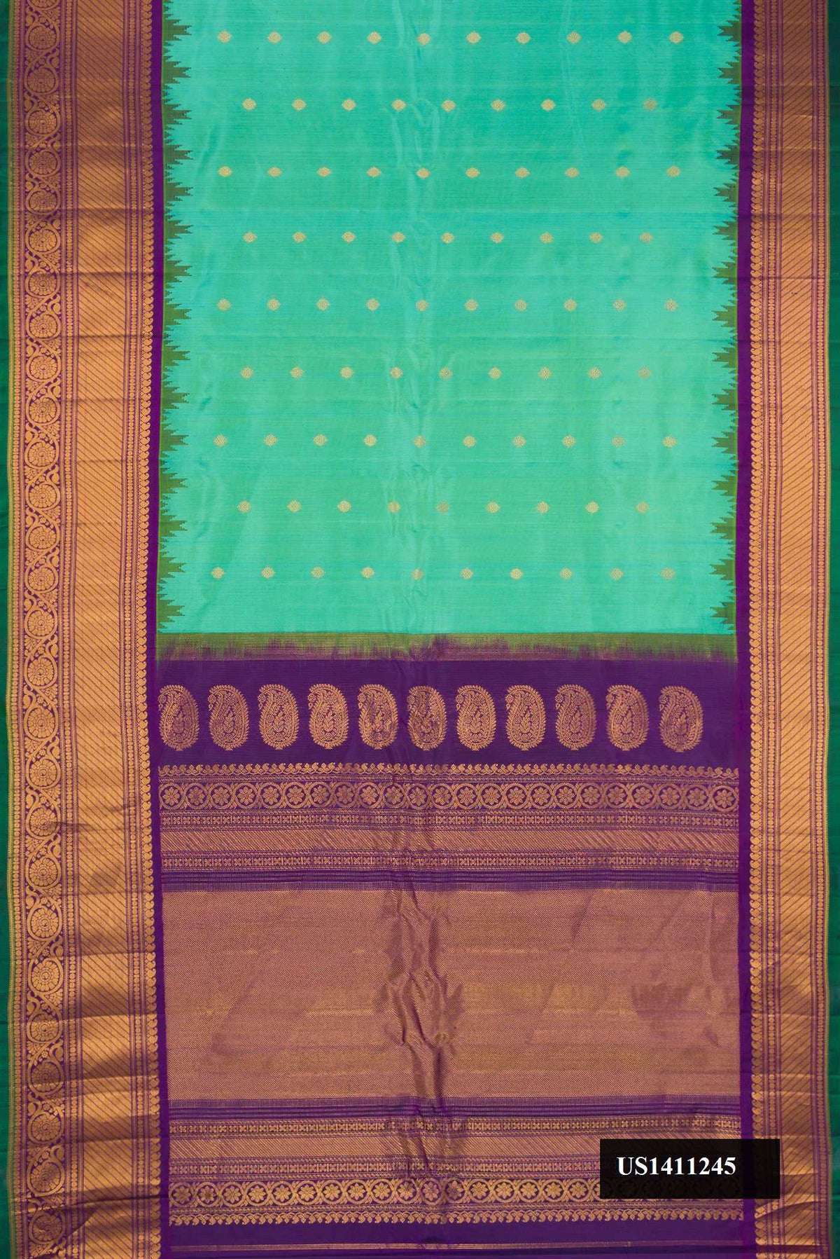 Sky Blue Dual Tone Gadwal Silk Saree with Zari Butta on the body and Fancy Border.  displayed on a mannequin