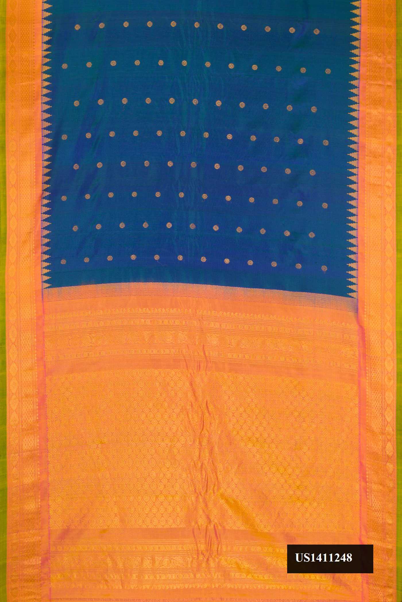 Peacock Blue Dual Tone Gadwal Silk Saree with Zari Butta on the body and Temple Border.  displayed on a mannequin