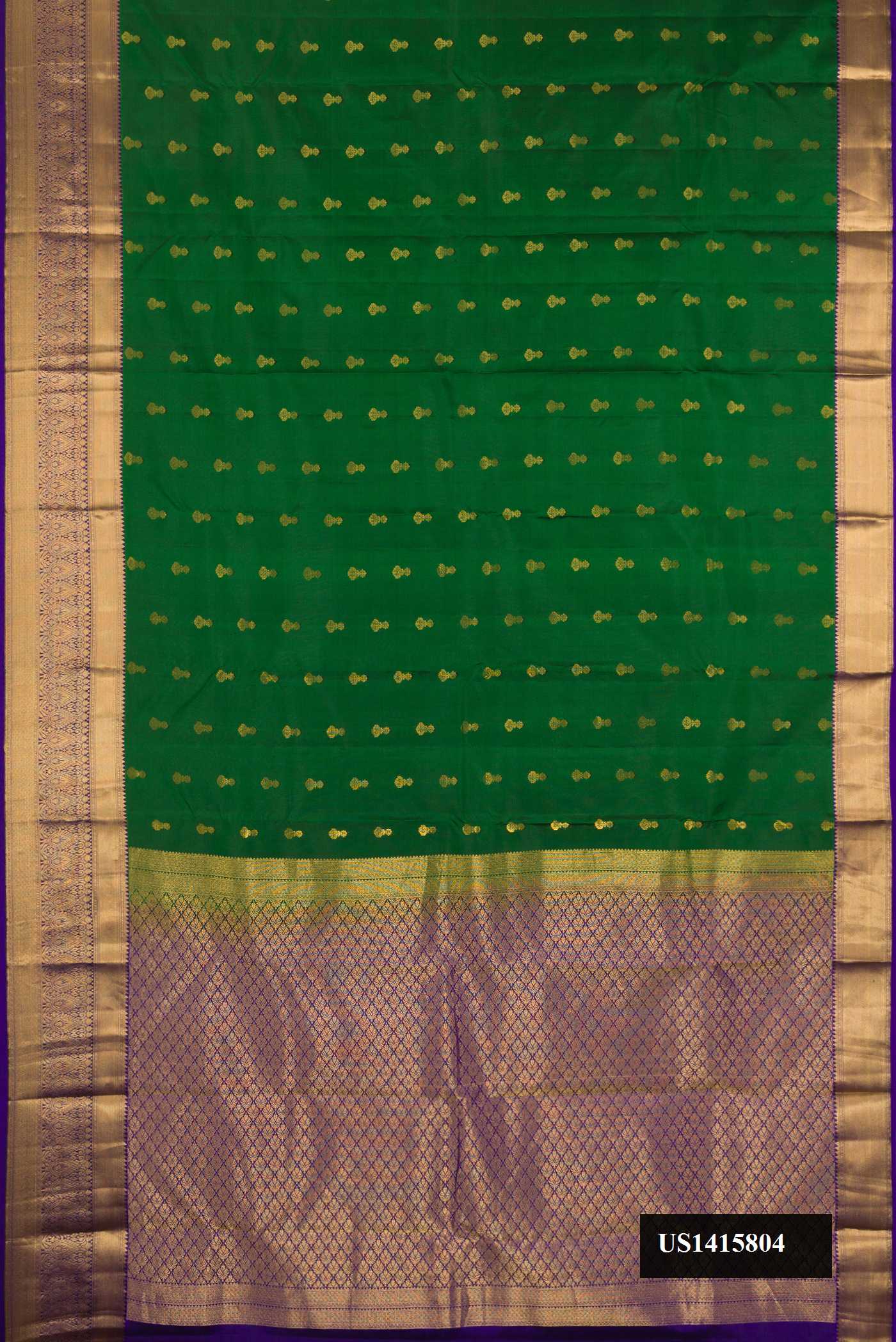 Green Dual Tone Kanchipuram Silk Saree with Zari Butta on the body and Zari Border.  displayed on a mannequin