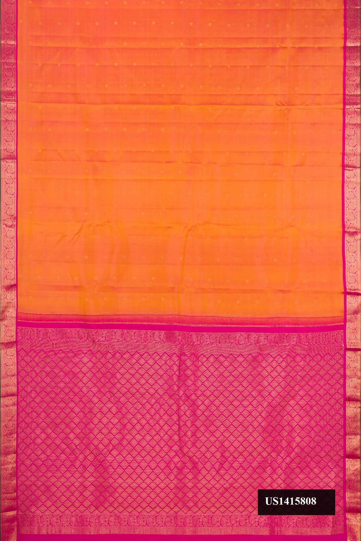 Golden Peach Dual Tone Kanchipuram Silk Saree with Zari Butta on the body and Zari Border.  displayed on a mannequin