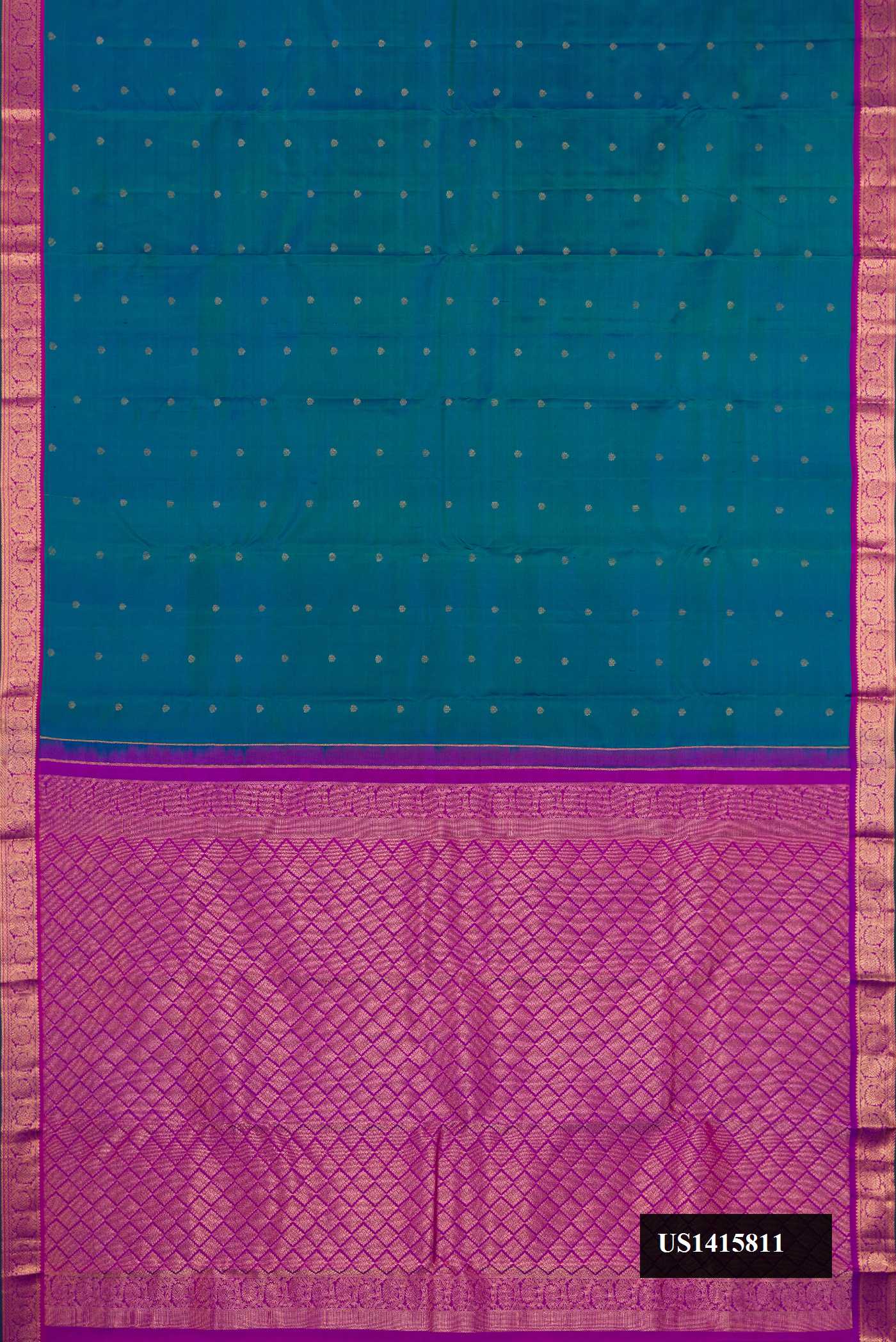 Peacock Blue Dual Tone Kanchipuram Silk Saree with Zari Butta on the body and Zari Border.  displayed on a mannequin