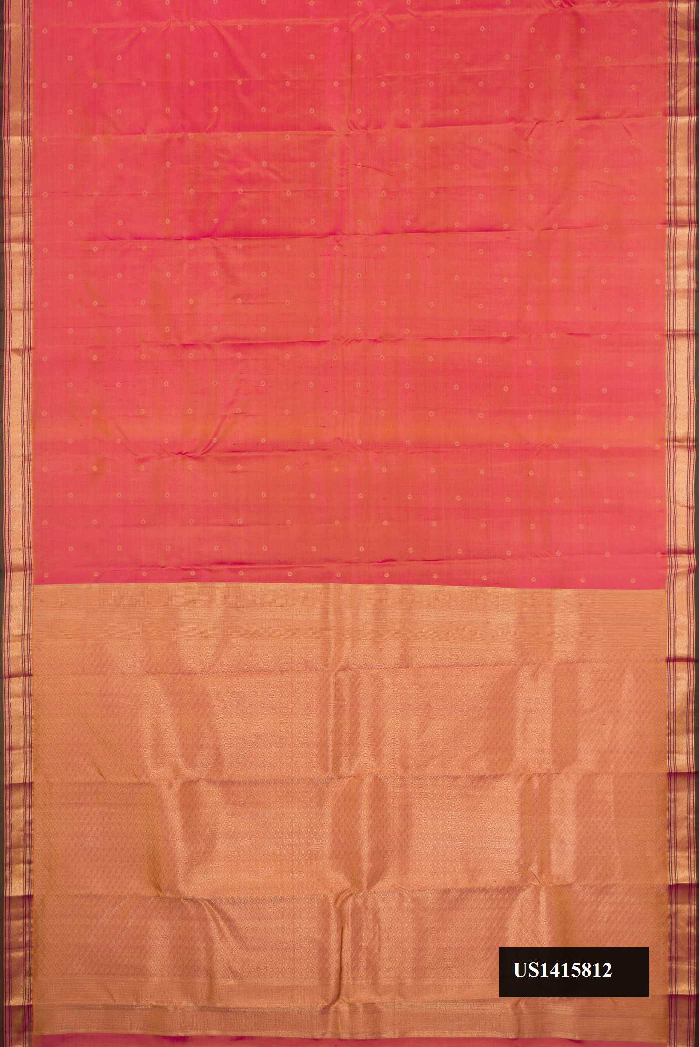 Dark Mauve Dual Tone Kanchipuram Silk Saree with Zari Butta on the body and Zari Border.  displayed on a mannequin