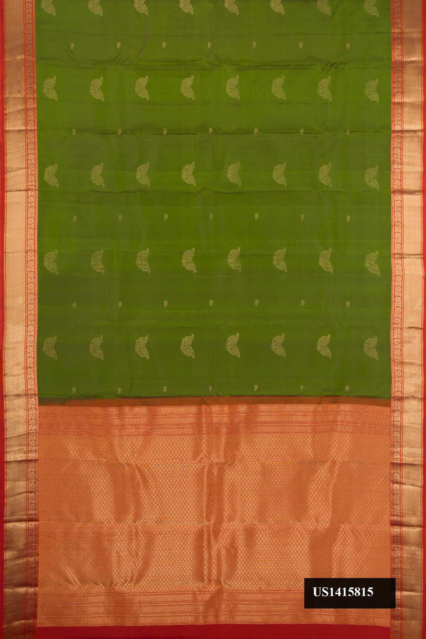 Green Dual Tone Kanchipuram Silk Saree with Zari Butta on the body and Zari Border.  displayed on a mannequin