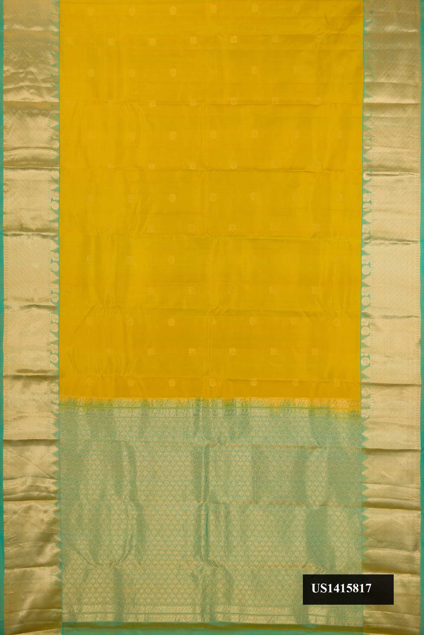 Mehandi Green Dual Tone Kanchipuram Silk Saree with Zari Butta on the body and Zari Border.  displayed on a mannequin