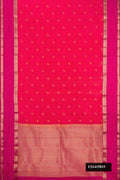 Coral Dual Tone Kanchipuram Silk Saree with Zari Butta on the body and Zari Border.  displayed on a mannequin
