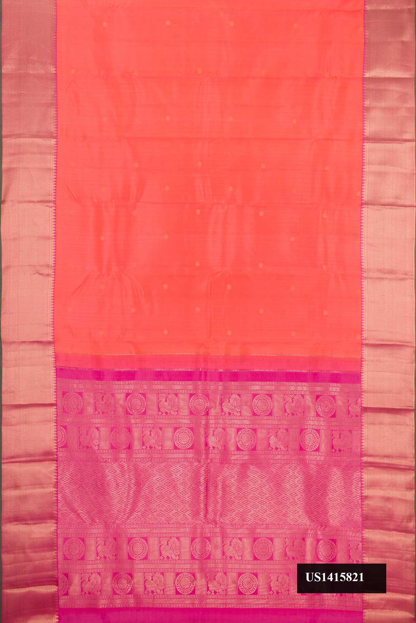 Peach Dual Tone Kanchipuram Silk Saree with Zari Butta on the body and Zari Border.  displayed on a mannequin