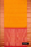Mustard Dual Tone Kanchipuram Silk Saree with Zari Butta on the body and Zari Border.  displayed on a mannequin
