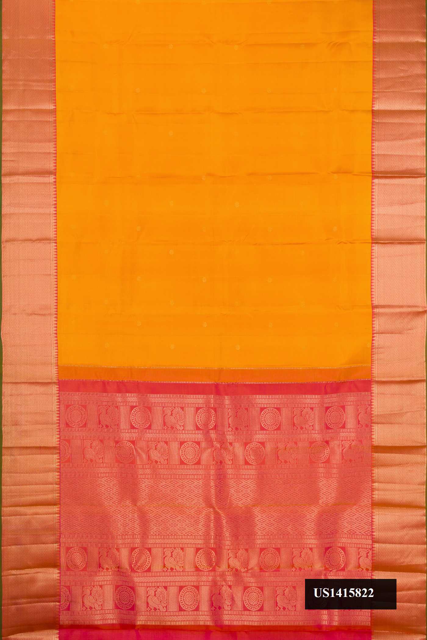 Mustard Dual Tone Kanchipuram Silk Saree with Zari Butta on the body and Zari Border.  displayed on a mannequin