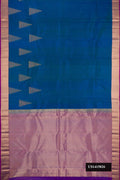 Peacock Blue Dual Tone Kanchipuram Silk Saree with Plain Body and Fancy Border.  displayed on a mannequin