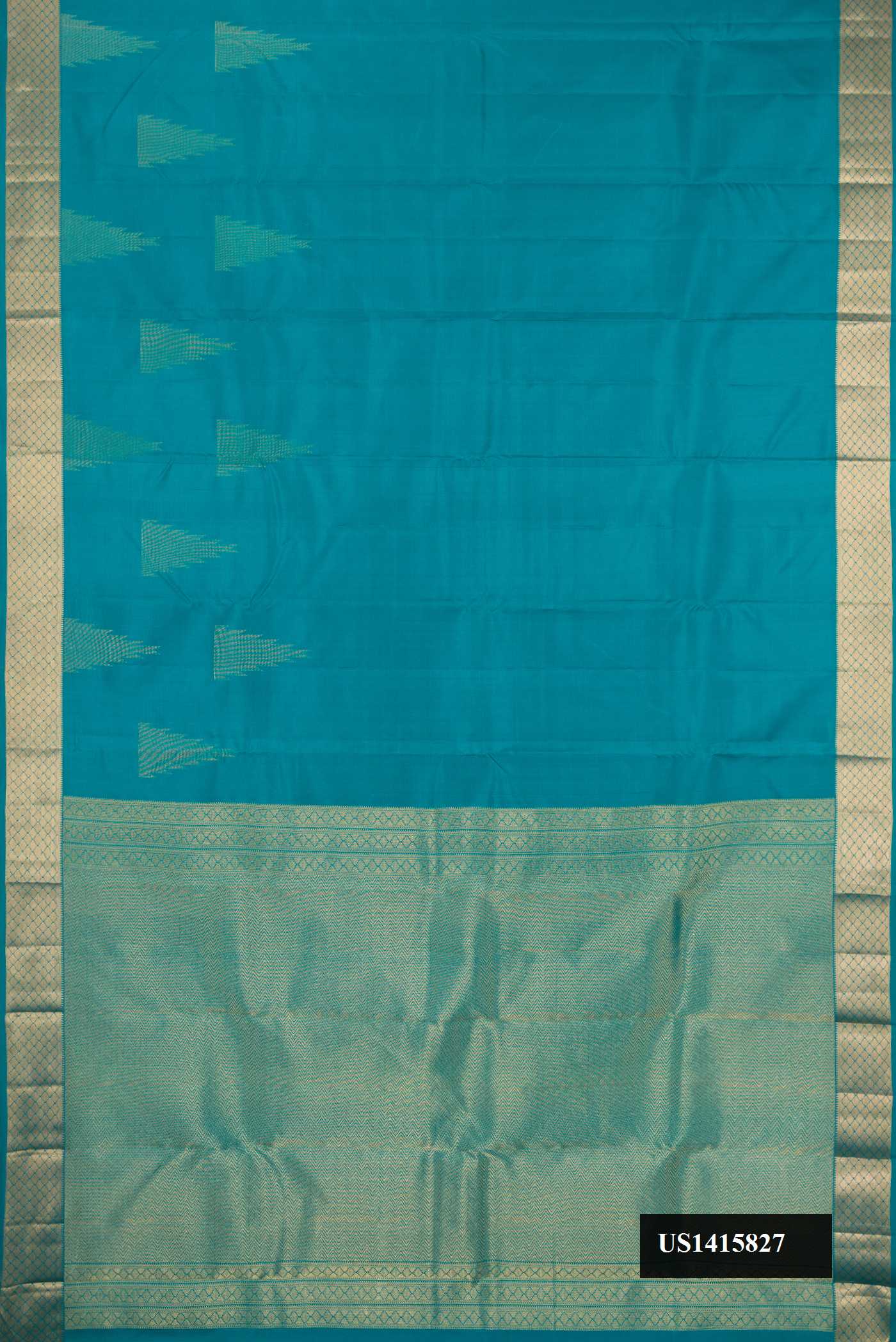 Teal Dual Tone Kanchipuram Silk Saree with Zari Butta on the body and Fancy Border.  displayed on a mannequin