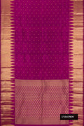 Magenta Dual Tone Kanchipuram Silk Saree with Zari Butta on the body and Fancy Border.  displayed on a mannequin