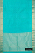 Sky Blue Dual Tone Kanchipuram Silk Saree with Zari Butta on the body and Zari Border.  displayed on a mannequin