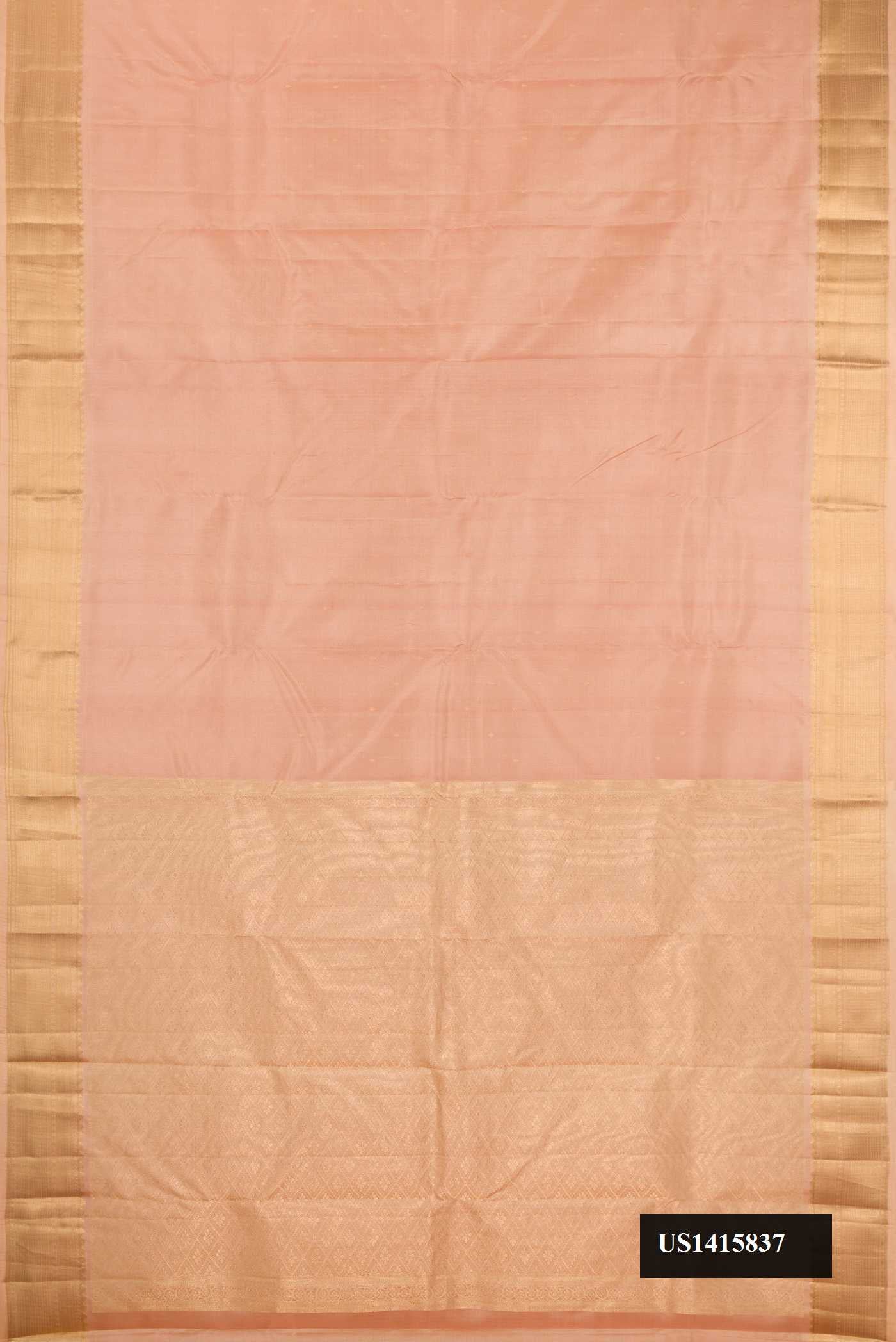 Rose Gold Dual Tone Kanchipuram Silk Saree with Zari Butta on the body and Zari Border.  displayed on a mannequin