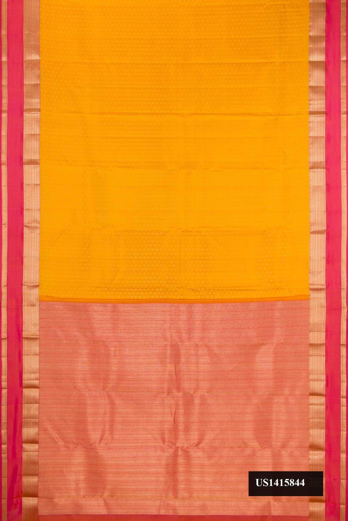 Mustard Dual Tone Kanchipuram Silk Saree with Zari Butta on the body and Zari Border.  displayed on a mannequin
